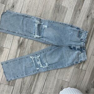 Women’s Distressed Blue Jeans